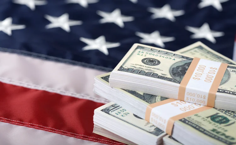 US flag and dollars