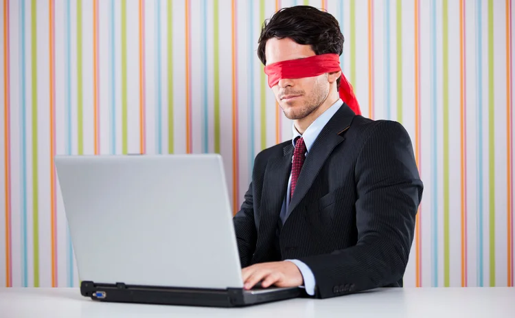 Blindfolded businessman