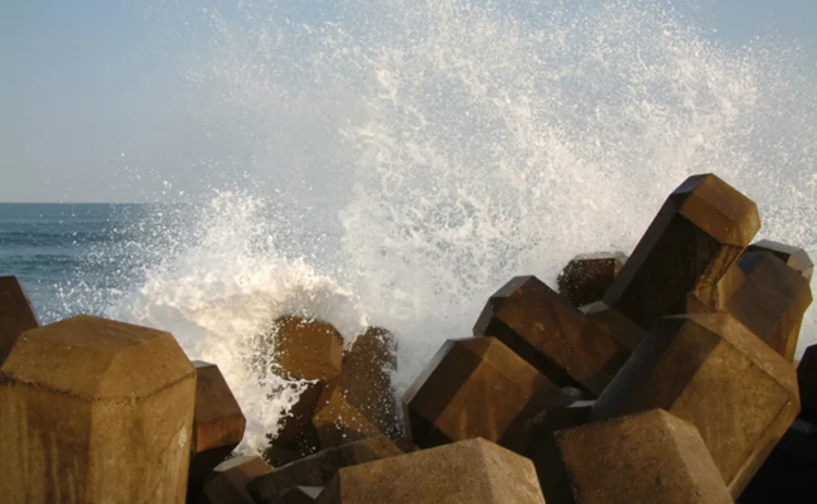 wave-crashing-against-breakwater